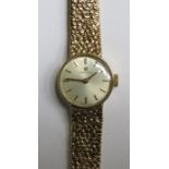 LADIES 9ct GOLD OMEGA WRISTWATCH WITH 9ct GOLD STRAP