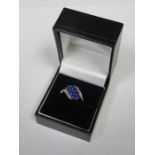 9ct GOLD DRESS RING SET WITH BLUE COLOURED STONES