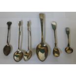 SIX VARIOUS SILVER AND SILVER COLOURED SPOONS