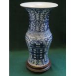 ORIENTAL STYLE BLUE AND WHITE GLAZED CERAMIC VASE ON STAND,