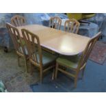 MODERN EXTENDING DINING TABLE AND SIX CHAIRS