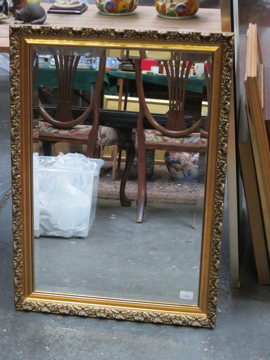 GILDED AND BEVELLED WALL MIRROR,