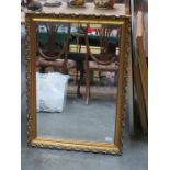 GILDED AND BEVELLED WALL MIRROR,