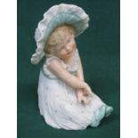 UNGLAZED CERAMIC PIANO BABE, POSSIBLY BY ROYAL WORCESTER,