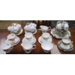 THREE VARIOUS FLORAL PART TEA SETS,