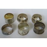 SIX VARIOUS SILVER NAPKIN RINGS