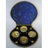 CASED SET OF FOUR HALLMARKED SILVER SHELL FORM OPEN SALTS WITH SPOONS,