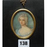 A framed portrait miniature Portrait of a lady with a rose in her hair, 7 x 6cm.