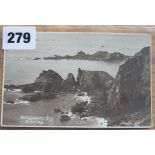 A real photographic postcard by W & E. Bailey, Alderney numbered 2907, Granville Bay, Alderney.