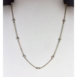 A 9ct gold and cultured pearl necklace.