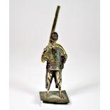 A small Chinese white metal figure of a man carrying a fishing pole, H. 8cm.