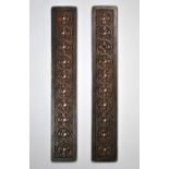 A pair of early 20th century Chinese bronze scroll weights, L. 21cm.