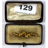 A 15ct gold Victorian bar brooch, W. 4.8cm.