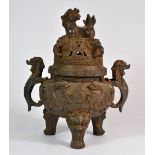 A Chinese cast iron censor with dragon handles and lid, H. 29cm.