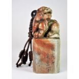 A mid 20th century Chinese carved soapstone seal, H. 9.5cm.