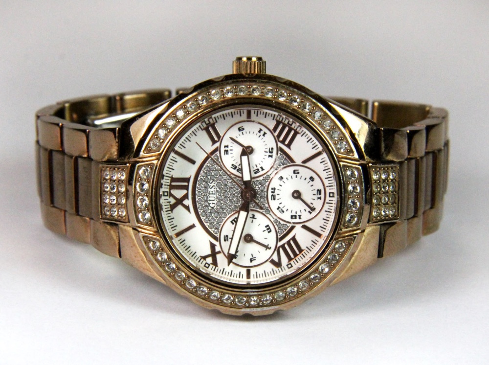 A stone set Guess wristwatch.