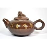 A Chinese polished stone teapot with carved dragon lid interior, H. 9.5cm.
