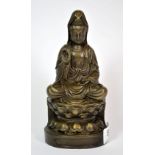A Chinese cast bronze figure of the Goddess Guan Yin, H. 18.5cm.