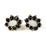 A pair of 9ct yellow gold sapphire and opal cluster earrings.