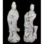 Two mid 20th century Chinese blanc de chine figures of the Goddess Guan Yin, H. 31.5cm.