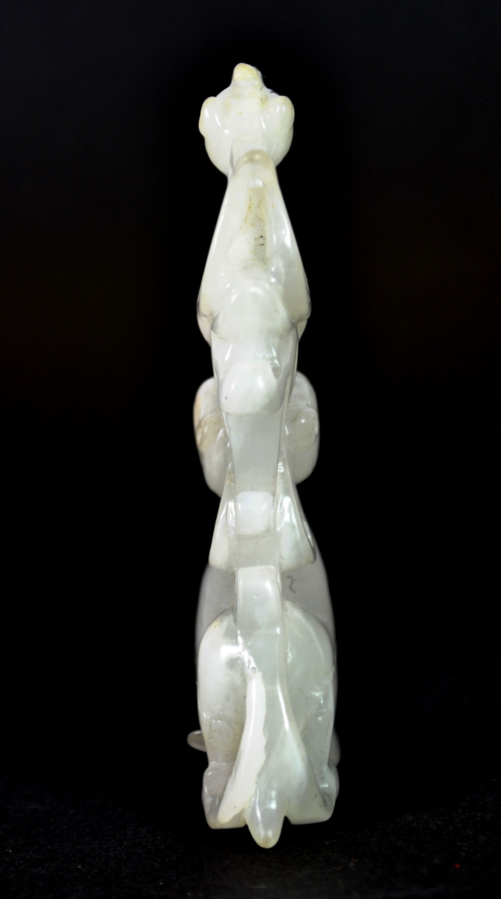 A very finely carved 19th/early 20thC Chinese white jade figure of a phoenix sitting on a dragons - Image 4 of 4