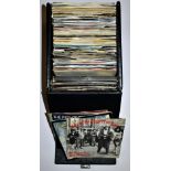 A case of 45rpm picture sleeve singles.