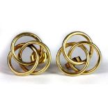 A pair of 9ct gold triple hoop earrings, W. 1.7cm.