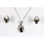 A pair of 18ct white gold green diopside earrings together with a matching diopside pendant and