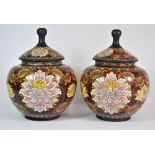 A pair of Chinese cloisonné jars and lids, H. 26cm.
