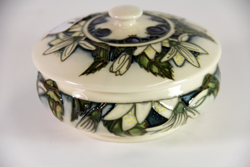 A Moorcroft 'Juneberry' pattern circular box and lid, c. 2000, Dia. 13cm, H. 8cm. Excellent - Image 3 of 5
