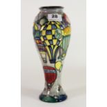A Moorcroft pottery vase decorated with hot air balloons designed by Jeanne McDougall, c. 1998, H.