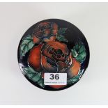 A Moorcroft 'Rose' pattern powder box and cover, signed by designer, limited edition 141/500, H. 6.