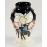 A Moorcroft 'Sweet pea' pattern vase, c. 2001, Dia. 13cm, H. 10cm, (Boxed). Excellent condition.