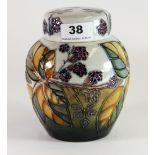 A Moorcroft 'Red Berries' design ginger jar and cover, c. 1995, H. 16cm. Excellent condition.
