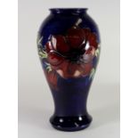 A large and impressive Moorcroft 'Anemones' pattern vase, impressed factory marks and signature to