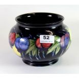 A William Moorcroft pottery 'Wisteria' pattern circular bowl, impressed factory marks and