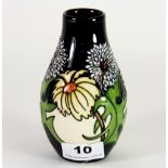 A Moorcroft 'Daisy May' pattern vase by Kerry Goodwin, c. 2008, H. 13.5cm, (Boxed). Excellent