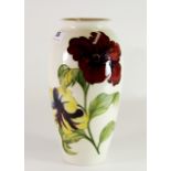 A large Moorcroft 'Hibiscus' design vase with impressed factory marks, signature and original