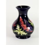 A Moorcroft 'Anemone' pattern vase by Emma Bossons, c. 1994, H. 16.5cm, (Boxed). Excellent