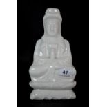 A polished Chinese white marble figure of the Goddess Guan Yin, H. 27cm.