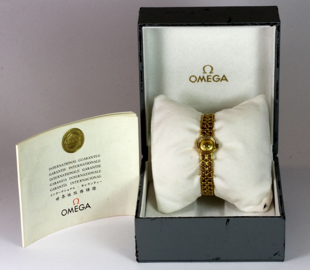 An 18ct lady's 1960's Omega wrist watch with integral strap and original box. - Image 3 of 3