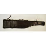 A leg of mutton leather gun case, L. 78cm.