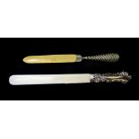 A hallmarked silver and ivory page turner and a further ivory and metal handle page turner.