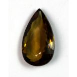 An un-mounted 16.34ct pear shaped smokey quartz.