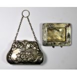 An Art Nouveau silver plated purse and an enamelled Art Nouveau photo frame.