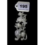 A lovely 19th / early 20th century Chinese carved white jade figure of a dragon and phoenix, H. 9cm,