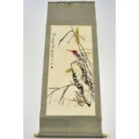 A silk mounted Chinese hand painted scroll, mid 20th century, W. 61cm, (some foxing). Prov: