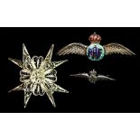 Two RAF silver pins and a filigree Maltese cross.