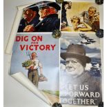 A quantity of reproduction WWII propaganda posters.