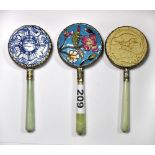 Three Chinese hand mirrors.